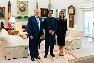 Khan with US President Donald Trump and First Lady Melania Trump at the White House in July 2019